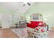 Bright living room boasts vaulted ceilings, a ceiling fan, and neutral-toned walls at 570 Botany Loop Murrells Inlet # 570, Murrells Inlet, SC 29576