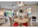Bright dining area adjacent to living room with sliding doors to outdoor patio at 5825 Catalina Dr. # 1133, North Myrtle Beach, SC 29582