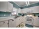 Efficiently-designed kitchen with ample counter space and white appliances at 5825 Catalina Dr. # 1133, North Myrtle Beach, SC 29582