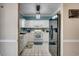 Bright kitchen with white cabinets, modern appliances, and tile floor at 5825 Catalina Dr. # 1133, North Myrtle Beach, SC 29582