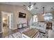 Bright living room featuring a ceiling fan, TV, and modern furnishings and decor at 5825 Catalina Dr. # 1133, North Myrtle Beach, SC 29582