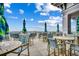 Inviting outdoor patio seating area with umbrellas, tables, and ocean views at 5825 Catalina Dr. # 1133, North Myrtle Beach, SC 29582