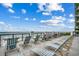 Relaxing outdoor patio with lounge chairs overlooking the beach and ocean at 5825 Catalina Dr. # 1133, North Myrtle Beach, SC 29582