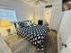 Coastal bedroom with charming decor, whale-themed bedding and natural light at 6001 - 1268 S Kings Hwy., Myrtle Beach, SC 29575