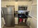 Modern kitchen features stainless steel appliances, granite countertops, and white cabinetry at 6001 - 1268 S Kings Hwy., Myrtle Beach, SC 29575