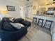 Cozy living room with modern furnishings next to the breakfast bar area at 6001 - 1268 S Kings Hwy., Myrtle Beach, SC 29575