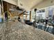 Gourmet outdoor kitchen with stainless steel grill, granite countertops, and ample counter space at 6001 - 1268 S Kings Hwy., Myrtle Beach, SC 29575