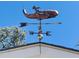 Close-up of a unique whale weathervane sitting atop a beach house at 6001 - 1268 S Kings Hwy., Myrtle Beach, SC 29575