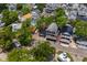 An aerial view of a two story home with dual decks and a spacious driveway in a beautiful neighborhood at 6001 - 5010 S Kings Hwy., Myrtle Beach, SC 29575