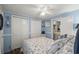 Inviting bedroom with a ceiling fan, closet space, and a comfortable bed at 6001 - 5010 S Kings Hwy., Myrtle Beach, SC 29575