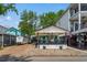 Charming home with covered porch, beautiful landscaping, parking trailer, and a driveway at 6001 - 5010 S Kings Hwy., Myrtle Beach, SC 29575