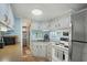 Charming kitchen with distressed cabinets, modern appliances, and ample counter space at 6001 - 5010 S Kings Hwy., Myrtle Beach, SC 29575