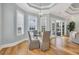 Bright dining area with lake views and sliding glass door to patio at 6004 Flowerdale Ct., Myrtle Beach, SC 29579