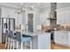 Kitchen with island, pendant lights, stainless appliances, and butler's pantry at 6004 Flowerdale Ct., Myrtle Beach, SC 29579