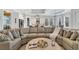 Spacious living room with breakfast bar and views of the modern eat-in kitchen at 6004 Flowerdale Ct., Myrtle Beach, SC 29579