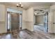 Inviting foyer featuring hardwood-style tile flooring and an open doorway to another room at 6013 Blease Ct., Myrtle Beach, SC 29588
