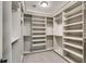 Spacious walk-in closet features custom shelving and ample storage space for clothing and accessories at 6013 Blease Ct., Myrtle Beach, SC 29588