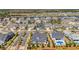 Aerial view of a neighborhood featuring a pool and backyard patios at 6121 Bolsena Place, Myrtle Beach, SC 29572