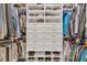 This walk-in closet is complete with custom shelving and storage for clothing, shoes and accessories at 6121 Bolsena Place, Myrtle Beach, SC 29572