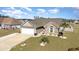 An aerial view of a single-story home showing a manicured lawn and partial fence at 621 Swinford Dr., Myrtle Beach, SC 29588