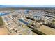 Aerial view of the neighborhood with homes surrounding water features at 621 Swinford Dr., Myrtle Beach, SC 29588
