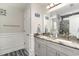 Bathroom featuring double sinks, granite countertops, vanity, and decorative accents at 621 Swinford Dr., Myrtle Beach, SC 29588