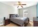 Comfortable bedroom with ceiling fan, a window with natural light, and a warm ambiance at 621 Swinford Dr., Myrtle Beach, SC 29588