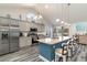 Bright kitchen featuring granite countertops, stainless steel appliances, bar seating and wood flooring at 621 Swinford Dr., Myrtle Beach, SC 29588