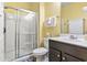 Bright bathroom with a stand-up shower, single sink vanity, and tiled floors at 6253 Catalina Dr. # 713, North Myrtle Beach, SC 29582