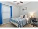 Charming bedroom with a bright window with curtains, a desk with a chair, and a cozy bed at 6253 Catalina Dr. # 713, North Myrtle Beach, SC 29582