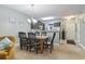 Bright dining area next to kitchen with dark cabinets and modern lighting at 6253 Catalina Dr. # 713, North Myrtle Beach, SC 29582