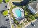 Aerial shot of a pool, parking lot, and pond at 6253 Catalina Dr. # 713, North Myrtle Beach, SC 29582