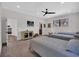 Spacious bedroom with three twin beds, a ceiling fan and carpet floors at 644 Whispering Pines Ct., Murrells Inlet, SC 29576