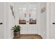 Stylish office with double glass doors, a potted plant, and nice wall decor at 644 Whispering Pines Ct., Murrells Inlet, SC 29576