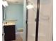 Bathroom featuring a vanity with granite countertop and glass shower at 6654 Wisteria Dr., Myrtle Beach, SC 29588