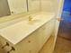 Bright bathroom with a long vanity, white countertop, and ample storage at 6654 Wisteria Dr., Myrtle Beach, SC 29588