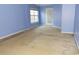 Bedroom features light blue walls, a window and a door to the outside at 6654 Wisteria Dr., Myrtle Beach, SC 29588