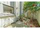 Charming home backyard area with lush camellia bushes and flowers at 7300 Porcher Dr. # 11, Myrtle Beach, SC 29572