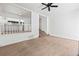 Living room with neutral carpeting and an open floor plan with stairs visible at 7300 Porcher Dr. # 11, Myrtle Beach, SC 29572