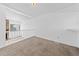 The loft space features plush carpeting, a window and overlooks the fireplace in the living room at 7300 Porcher Dr. # 11, Myrtle Beach, SC 29572