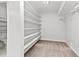 Spacious walk-in closet featuring ample shelving at 7300 Porcher Dr. # 11, Myrtle Beach, SC 29572