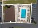 An aerial view of the community pool with seating, with convenient parking nearby at 800 9Th Ave. S # T3, North Myrtle Beach, SC 29582