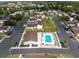 Birds-eye view of condo community with pool, manicured lawns, parking, and other community buildings at 800 9Th Ave. S # T3, North Myrtle Beach, SC 29582