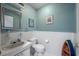 Cozy bathroom featuring a light blue wall color, white tile, and decorative nautical themed accessories at 800 9Th Ave. S # T3, North Myrtle Beach, SC 29582