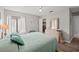 Inviting bedroom features a ceiling fan, dresser, and a walk-in closet at 800 9Th Ave. S # T3, North Myrtle Beach, SC 29582
