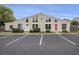 Inviting two-story condo featuring large windows, paired entrances, and dedicated parking spaces at 800 9Th Ave. S # T3, North Myrtle Beach, SC 29582