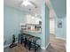 Stylish breakfast bar with granite countertops, pendant lighting, and modern bar stools at 800 9Th Ave. S # T3, North Myrtle Beach, SC 29582