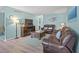 Comfortable living room with plush leather seating, modern decor, and sleek flooring at 800 9Th Ave. S # T3, North Myrtle Beach, SC 29582