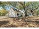 Well-maintained backyard with privacy fence and screened porch, offering a serene outdoor retreat at 81 Safe Harbor Ave., Pawleys Island, SC 29585