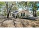 Charming backyard features a screened porch, perfect for relaxing and enjoying the outdoors at 81 Safe Harbor Ave., Pawleys Island, SC 29585